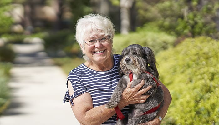 Woman holding a dog