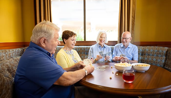 Residents gathered at Walnut Village's Red Chair Lounge