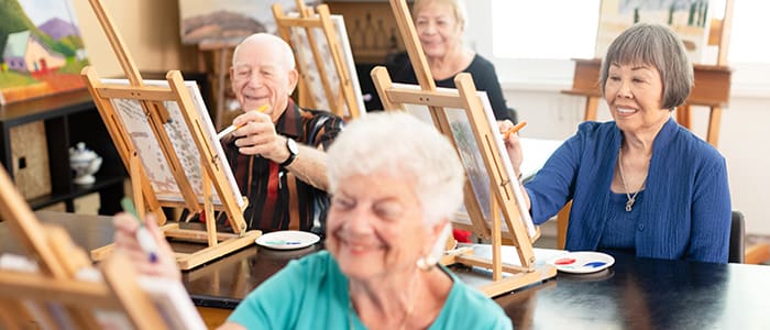 Portrait of group during painting class