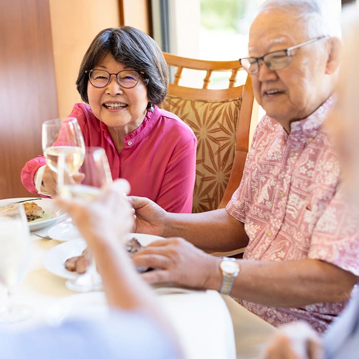 Resident at Walnut Village in the dining room